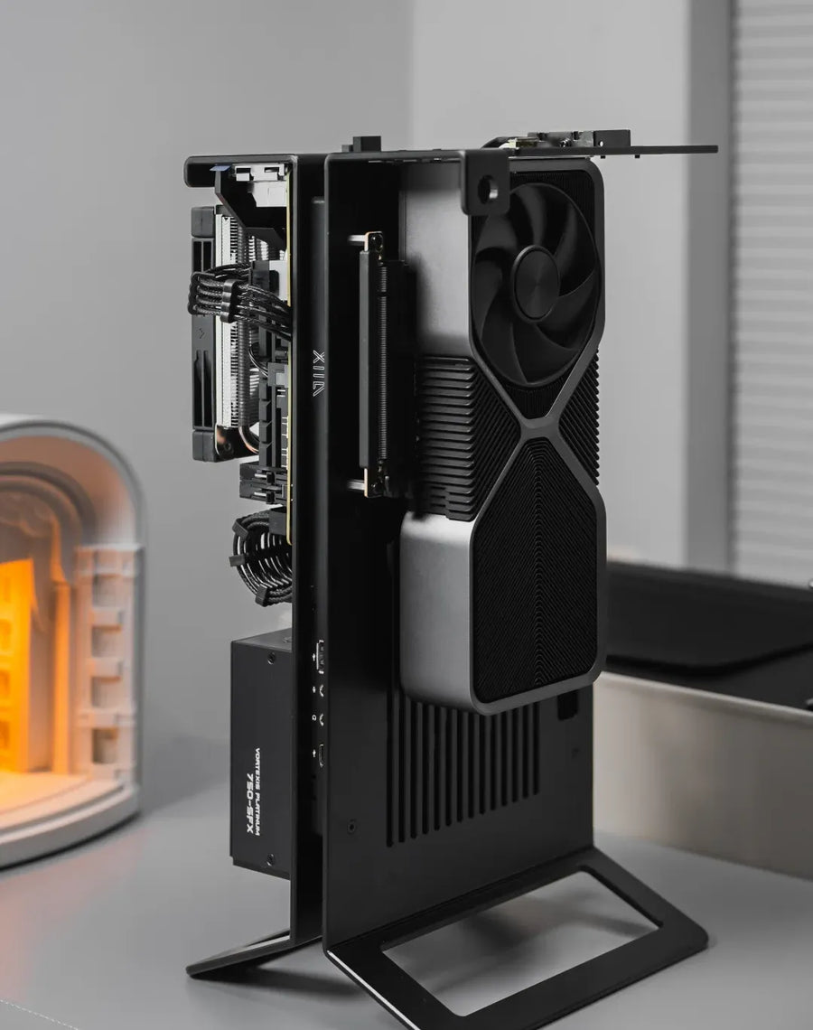 Stand the frame on its aluminum feet so the graphics card faces the room.