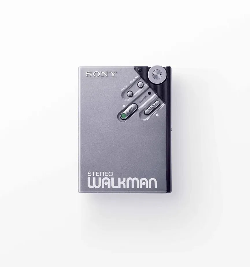 Keep playback controls within easy thumb reach using a recessed cluster on the WM-2.